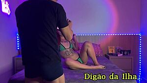 Tattooed hottie sucks cock oils up sheer red holiday backstage