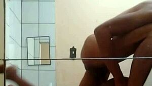 Hey, check out this muscular black couple giving brutal thrusts to her big ass in the hotel room