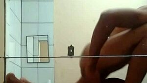 Hey, check out this muscular black couple giving brutal thrusts to her big ass in the hotel room