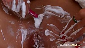 Watch this brunette tease her smooth shaved pussy solo just for fun