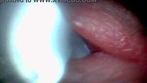 An endoscope camera records the close-up view of male ejaculation in real time.