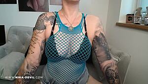 that sexy redhead teen in jeans shows off her big shaved ass and pierced nipples