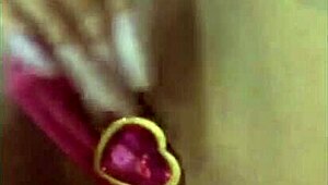This latina beauty grabs her dildo and masturbates solo in her cozy little home.