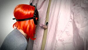 ginger amateur spots the gloryhole and starts teasing with her homemade blowjob skills