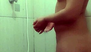 hot young 18+ girl steps into shower for steamy bathing session