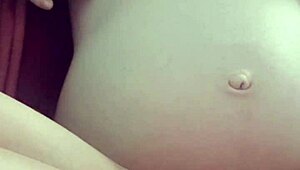 Hey, watch this pregnant babe masturbate her pussy?