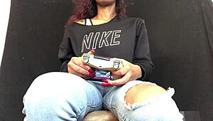 hey this ebony girl multitasks gaming while teasing her spots down there