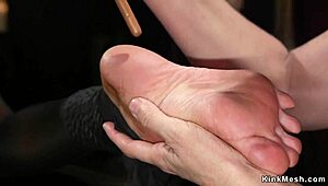 Milf lesbian dominatrix whips and chokes her busty bound slave