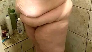 This curvy bbw wife soaps her big ass and natural tits in the shower solo. Part 2.