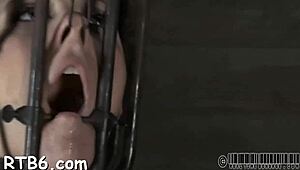 how does this gagged beauty's tight cunt take such vicious drilling from monster cock?