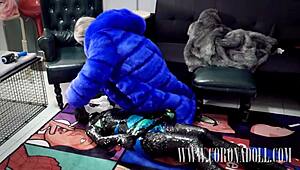 bound tight in three layers of tape over kigurumi catsuit