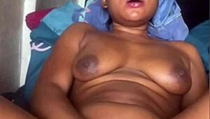 black ebony slut fingers her pussy rough till she cums hard.