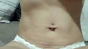 Watch this latin wife undress solo showing natural tits and hard nipples?