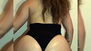 hey check out this sexy redhead cam girl shaking her juicy big tits