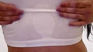 Emy Angel's wet t-shirt clings to every curve