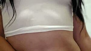 Emy Angel's wet t-shirt clings to every curve