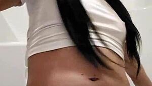 Emy Angel's wet t-shirt clings to every curve