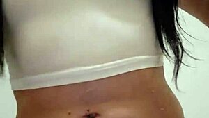 Emy Angel's wet t-shirt clings to every curve