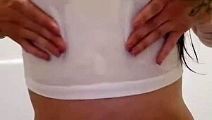 Emy Angel's wet t-shirt clings to every curve