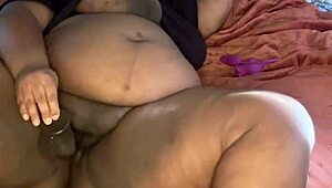 Pregnant bbw curiously tests new toy on her sensitive area gently
