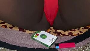 my red thong trimmed pussy tease in bedroom voyeur