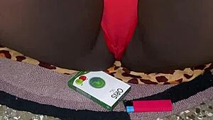 my red thong trimmed pussy tease in bedroom voyeur