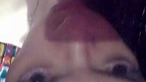 Natural titted ladyboy teases erotically in tight pink shirt