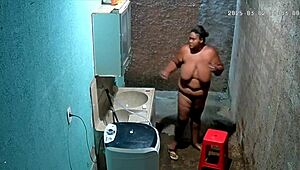 Hidden cam catches stepmom shaving pussy while stepson watches