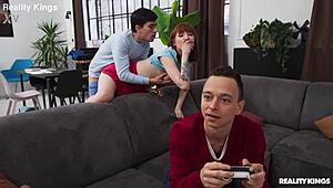 redhead gamer babe with tattoos bends over for athletic doggystyle pounding in reality kings scene