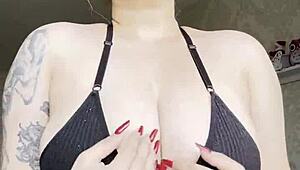 guy unloads thick cream all over her big natural tattooed tits