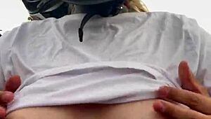 motogirl picks up guy on 99 bike grabs his hands on her big natural tits while riding he cums all over her tanned body