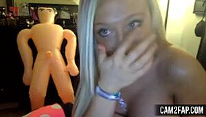 Hot blonde bares huge boobs for steamy webcam voyeur session