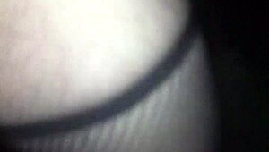 She wanders woods wearing only g-string fishnet stockings