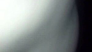 She wanders woods wearing only g-string fishnet stockings