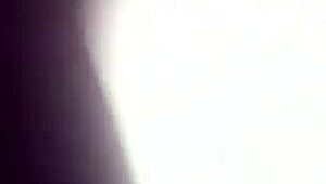 She wanders woods wearing only g-string fishnet stockings