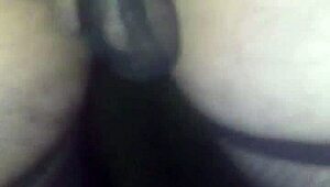 She wanders woods wearing only g-string fishnet stockings