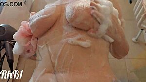 craving to soap up her juicy milf tits and redhead pussy?