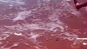 young african exhibitionist strips fully nude on crowded beach