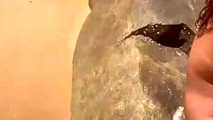 young african exhibitionist strips fully nude on crowded beach