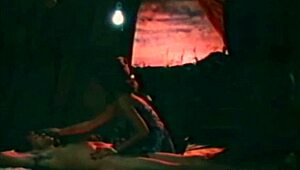 blonde goddess from porn's golden age teases her hairy pussy in retro fun