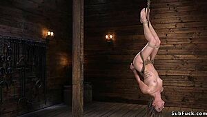 blonde hogtied slave endures rough fucking pain in bizarre bondage suspension