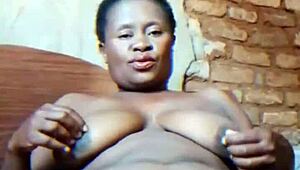 hey wanna watch this african milf finger her wet pussy alone?