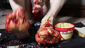 Muscular milf smears peanut butter on toes for footjob fantasy