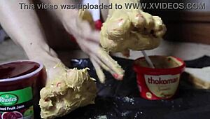 Muscular milf smears peanut butter on toes for footjob fantasy