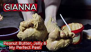 Muscular milf smears peanut butter on toes for footjob fantasy