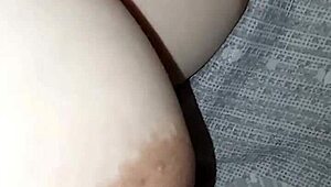 she flashes her big tits and belly on the street casually