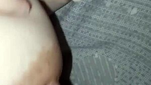 she flashes her big tits and belly on the street casually