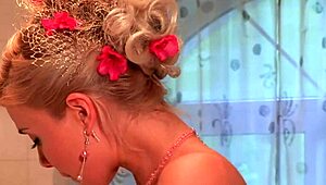 Blonde milf oils big tits and fingers shaved pussy in jacuzzi