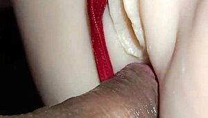 candy bends over for anal sex in her sexy red thong with pompon