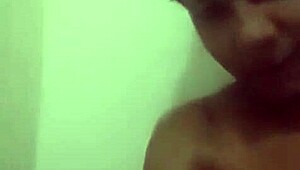 latina teen masturbates wildly in the bathtub